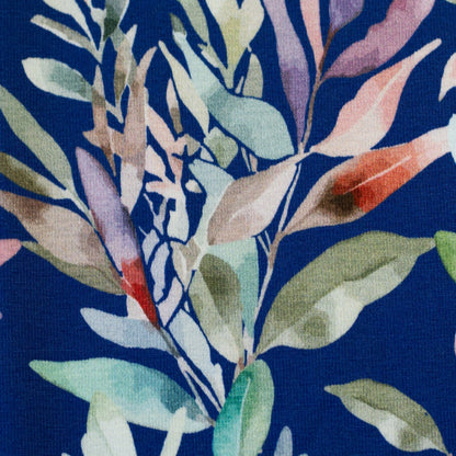 Cotton knit fabric - leaves on a blue background 200 g/m²