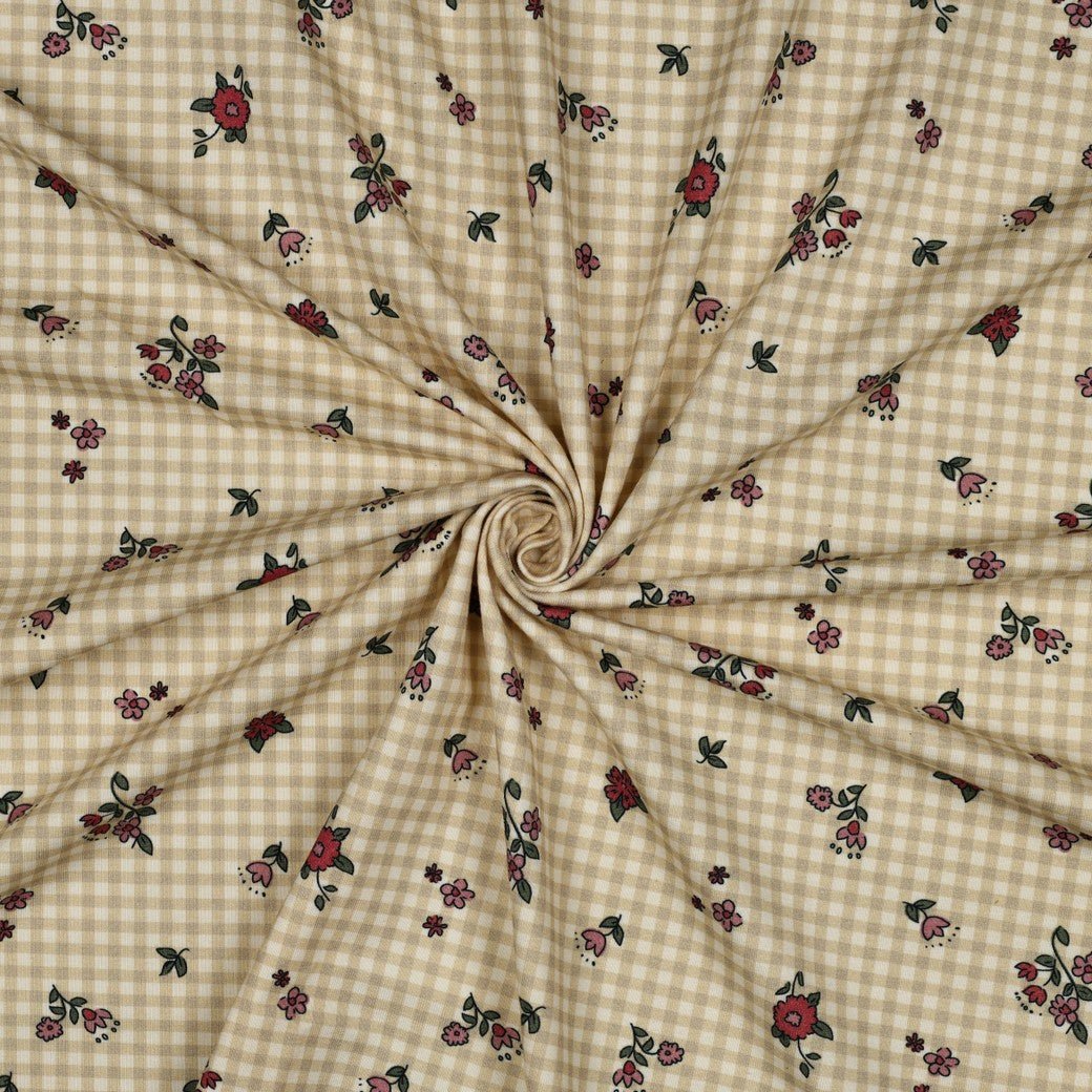 Image of cotton jersey knit - delicate little flowers on a checkered background 220 g/m² (GOTS certified) – available at Šarlotes audumi
