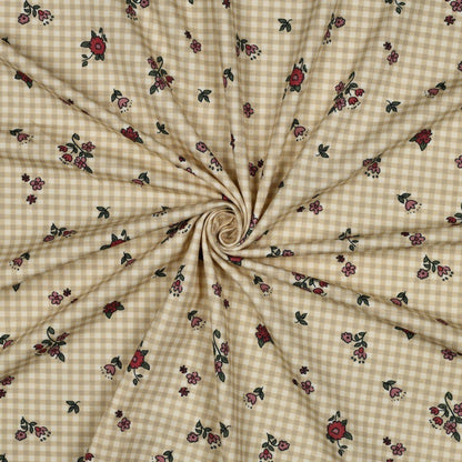 Image of cotton jersey knit - delicate little flowers on a checkered background 220 g/m² (GOTS certified) – available at Šarlotes audumi