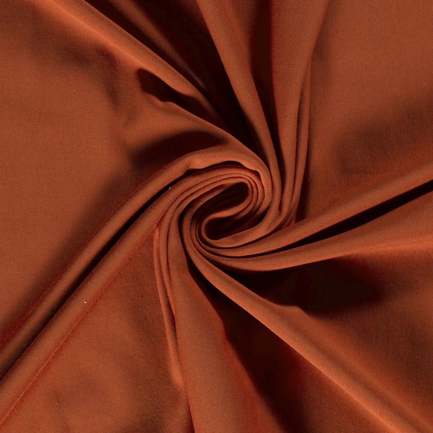 Image with cotton jersey - dark orange brick 210 g/m² – available at Šarlotes audumi