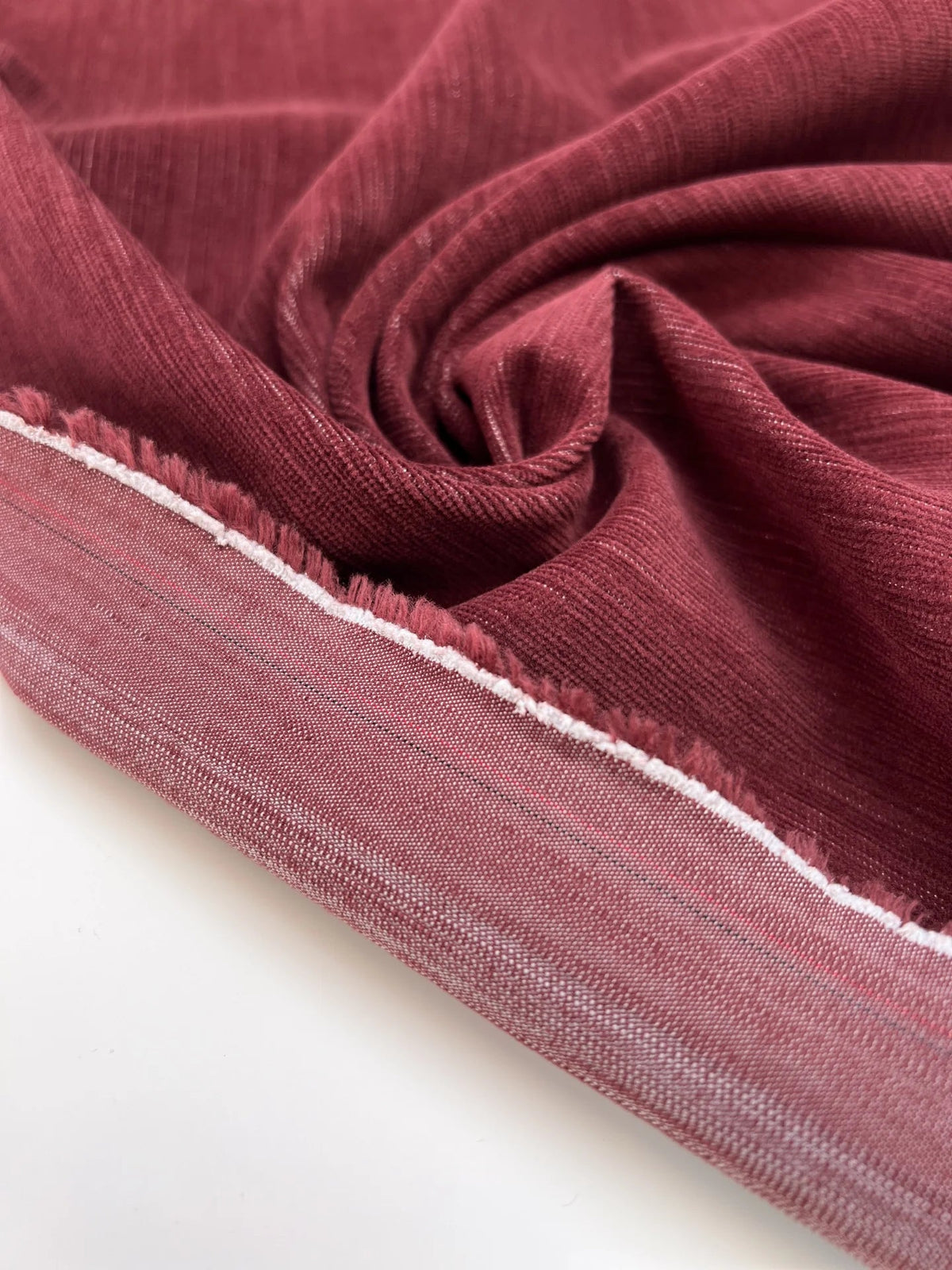 Image of cotton velour fabric with elastane in dark red – Italy – available online at Charlotte's Fabrics
