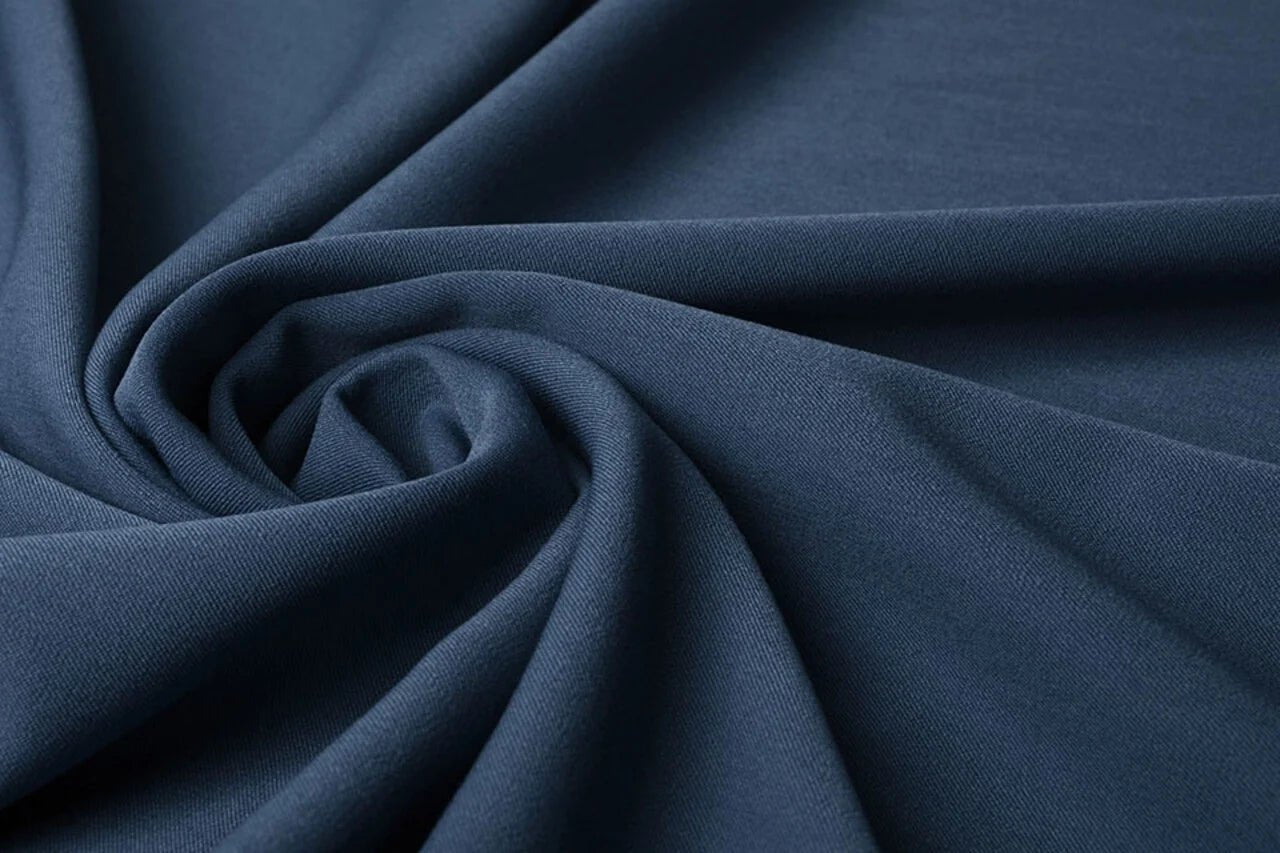 Image of suit fabric with elastane - denim blue 275 g/m² – available at Charlotte's Fabrics
