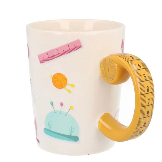 Image of a mug with a tape-measure handle, 500 ml, white/orange Sew Tasty – available at Charlotte’s fabrics