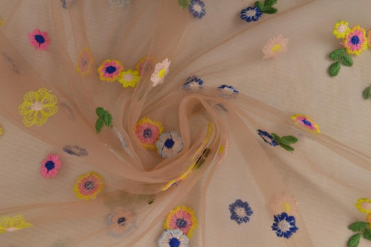Embroidered tulle fabric with flowers - peach tone 70 g/m²