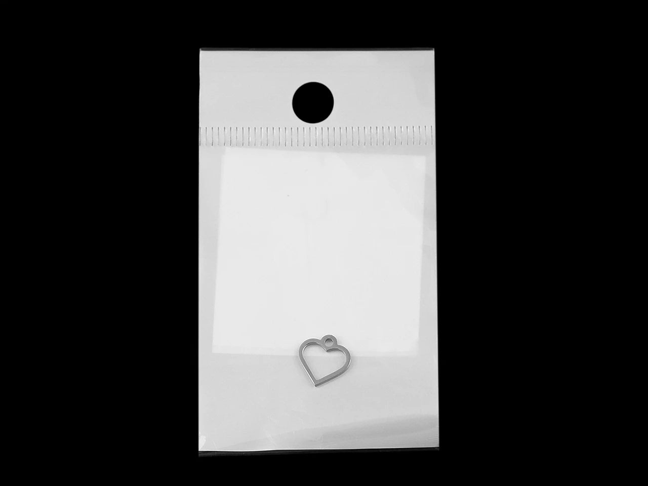 Image of a metal heart pendant | various shades – available at Charlotte’s Fabrics