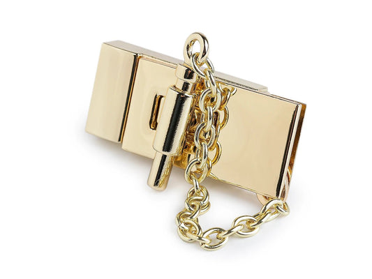 Metal bag clasp with chain 25 × 58 mm – available online at Šarlotes audumi