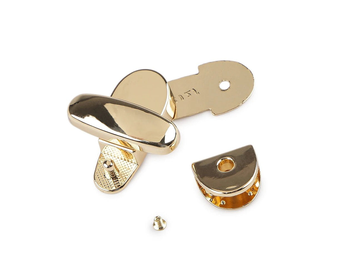 Image of metal bag clasp/lock 19 × 43 mm – available online at Charlotte's Fabrics