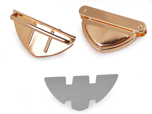 Image of metal bag clasp / lock 50 × 25 mm – rose gold – available online at Šarlotes audumi