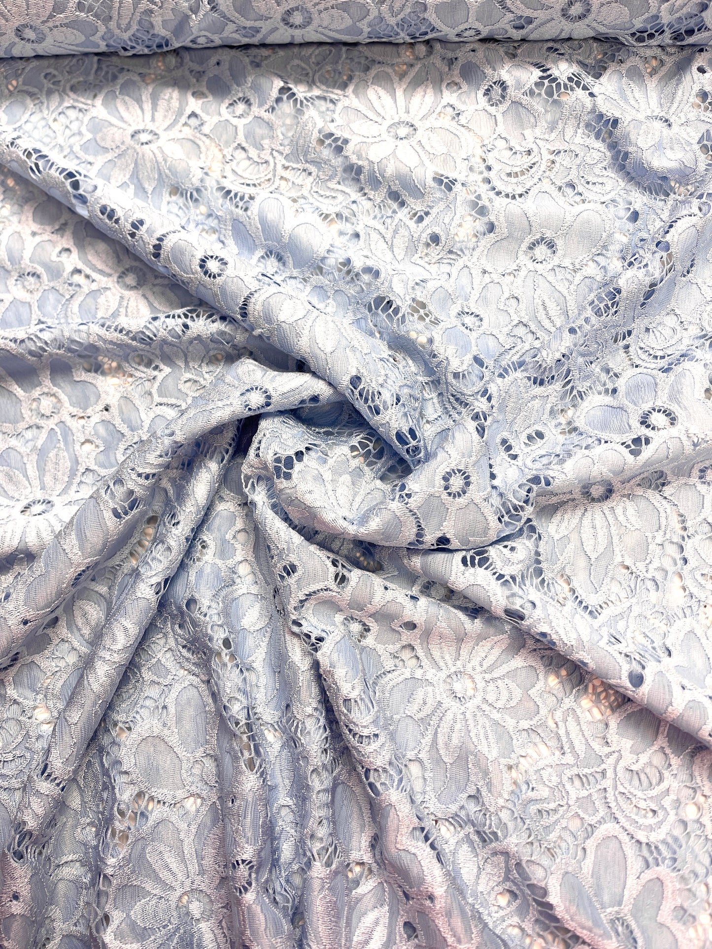 Image with lace fabric - light blue flower 150 g/m² – available at Šarlotes audumi