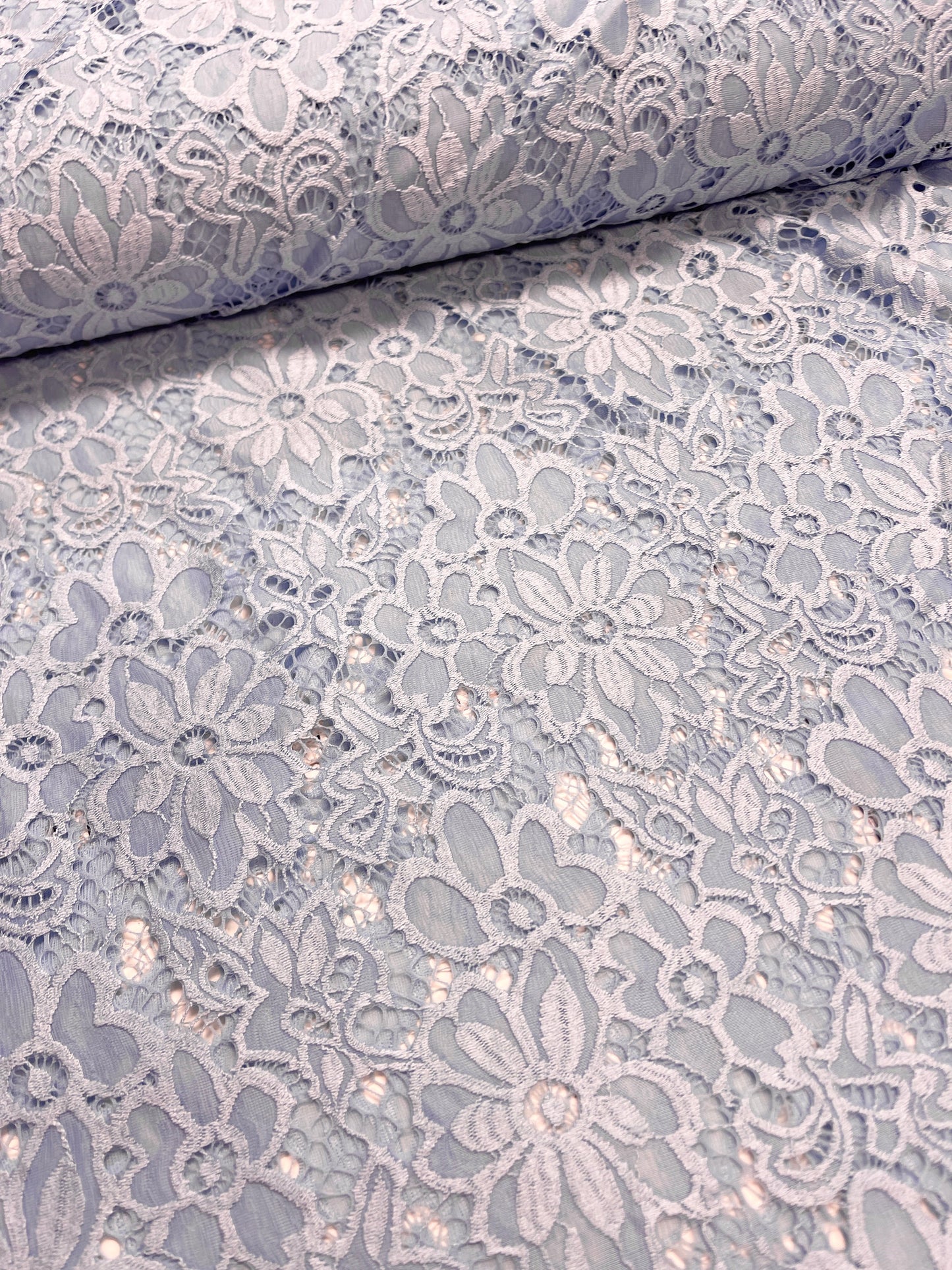 Image of Lace fabric - light blue flower 150 g/m² – available at Šarlotes audumi