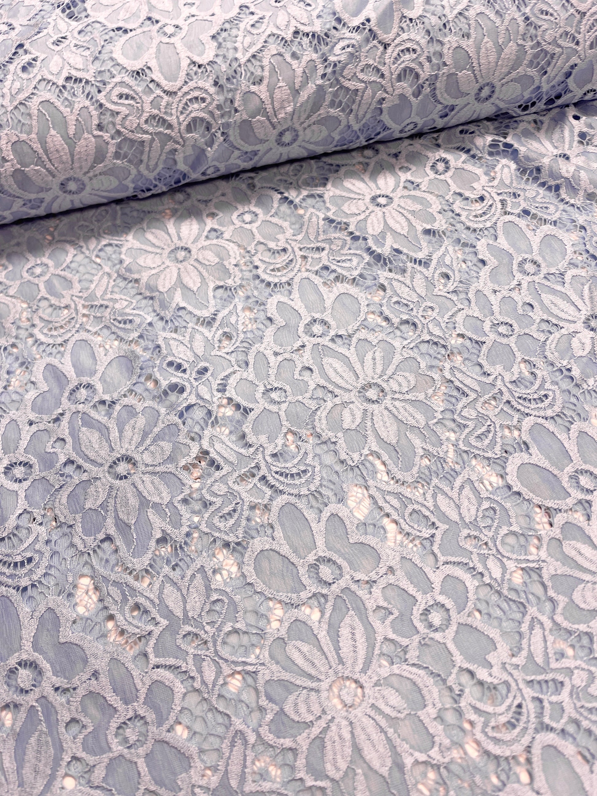 Image of Lace fabric - light blue flower 150 g/m² – available at Šarlotes audumi
