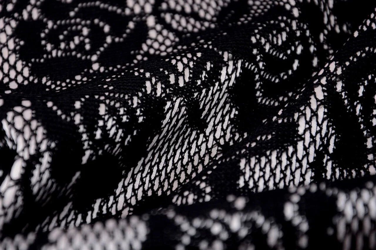 Image with lace fabric - black with white satin lining 155 g/m² – available at Šarlotes audumi