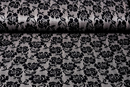Image with lace fabric - black with white satin lining 155 g/m² – available at Charlotte's Fabrics
