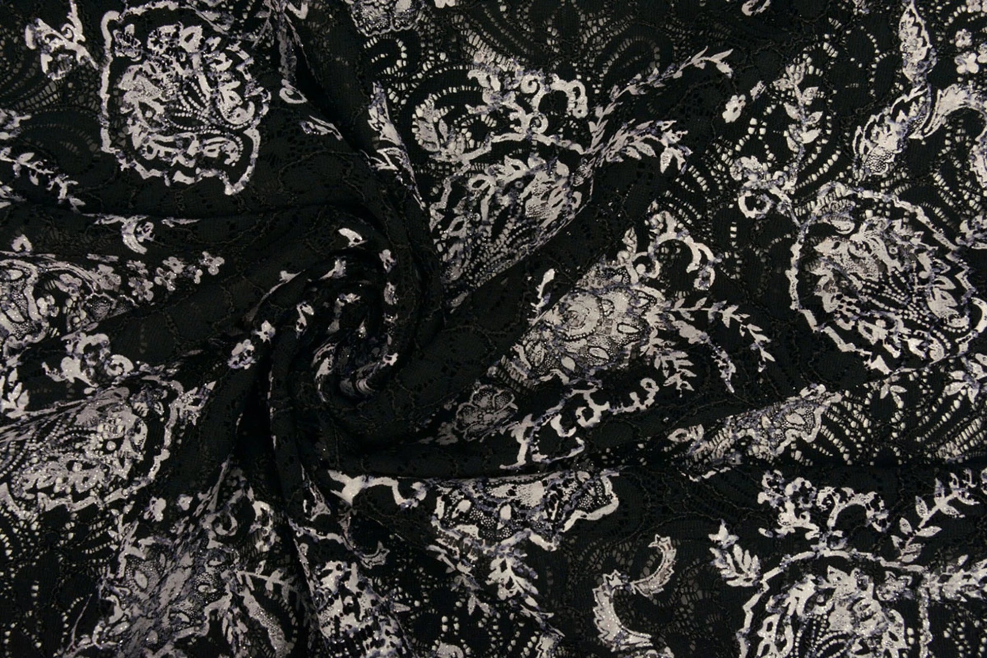 Image with lace fabric - black with silver 210 g/m² – available at Šarlotes audumi