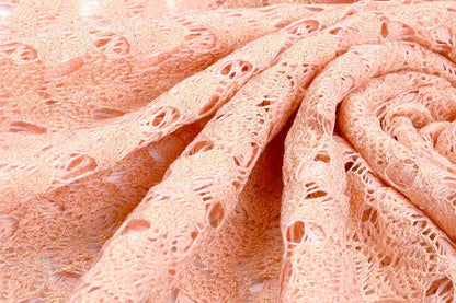 Lace fabric - peach pink with gold accents 170 g/m²