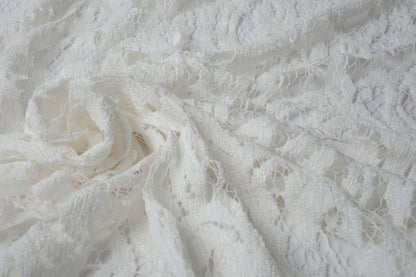 Tissu en dentelle - velours blanc crème 200 g/m²