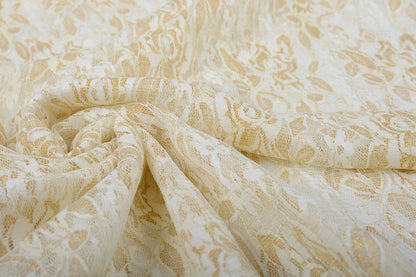 Delicate lace fabric with gold - black 90 g/m²