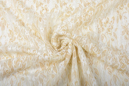 Fine lace fabric with gold - black 90 g/m²