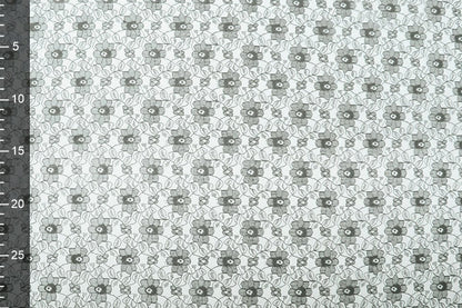 Tissu en dentelle fin - fleurs noires 75 g/m²