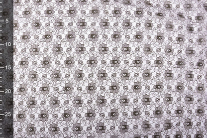 Image de tissu dentelle fin - fleurs brun chocolat 75 g/m² – disponible chez Šarlotes audumi