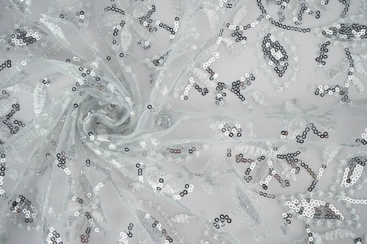 alt
Image with lace fabric|Embroidered tulle with sequins 160 g/m² - silver – available at Charlotte's fabrics