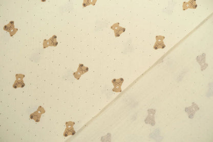 Muslin - teddy bears on a butter-yellow background 125 g/m²