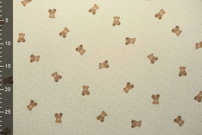 Muslin - teddy bears on a butter-yellow background 125 g/m²