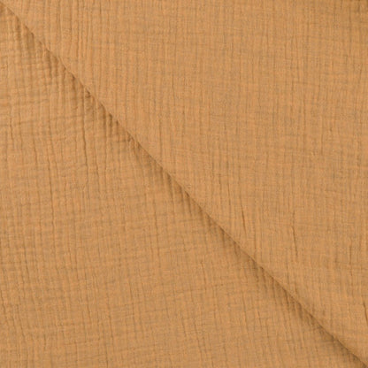 Image of Muslin milk caramel – available online at Charlotte Fabrics