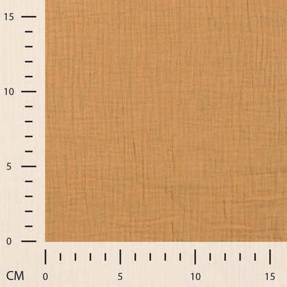 Image of muslin in milk caramel, available online at Šarlotes audumi