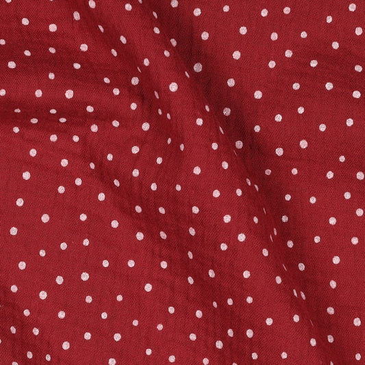 Image de mousseline à pois sur fond rouge foncé 125 g/m² – disponible chez Tissus Charlotte