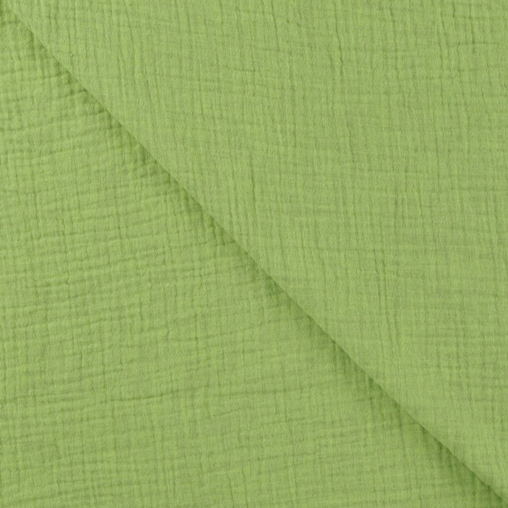 Image of green melange muslin – available online at Charlotte's Fabrics