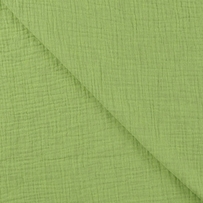 Image of green melange muslin – available online at Charlotte's Fabrics