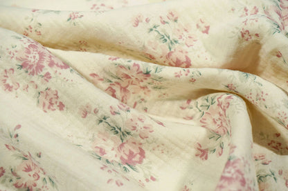 Muslin - flowers on a milky white background 140 g/m²