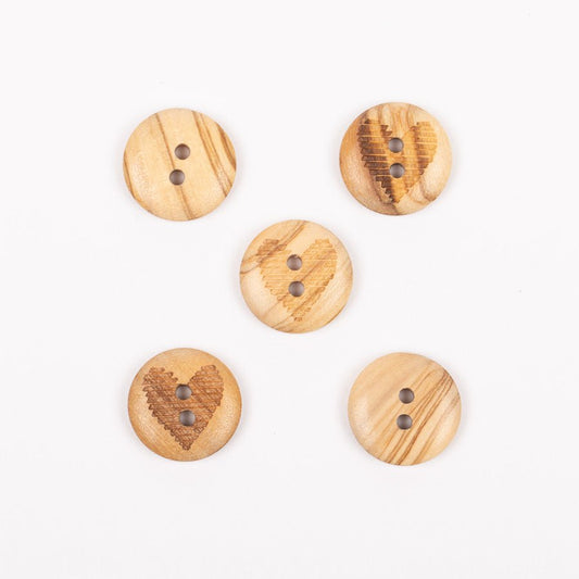 Image of olive wood heart buttons, 15 mm – available online at Šarlotes audumi