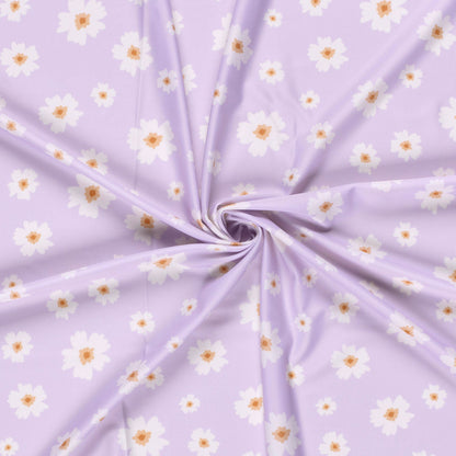 Image d’un tissu de maillot de bain en lycra avec protection UPF50 – fleurs sur lilas, 200 g/m² – disponible chez Šarlotes audumi