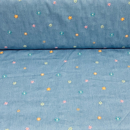 Image of thin denim fabric for dresses, shirts with embroidered flowers 135 g/m² – available at Šarlotes audumi
