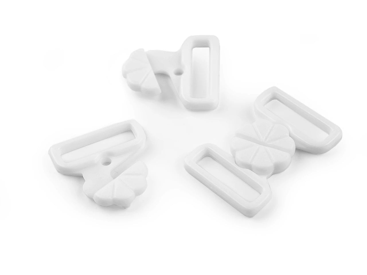 Fermetures en plastique pour maillots de bain – 17 mm, 5 paires – disponible chez Šarlotes audumi
