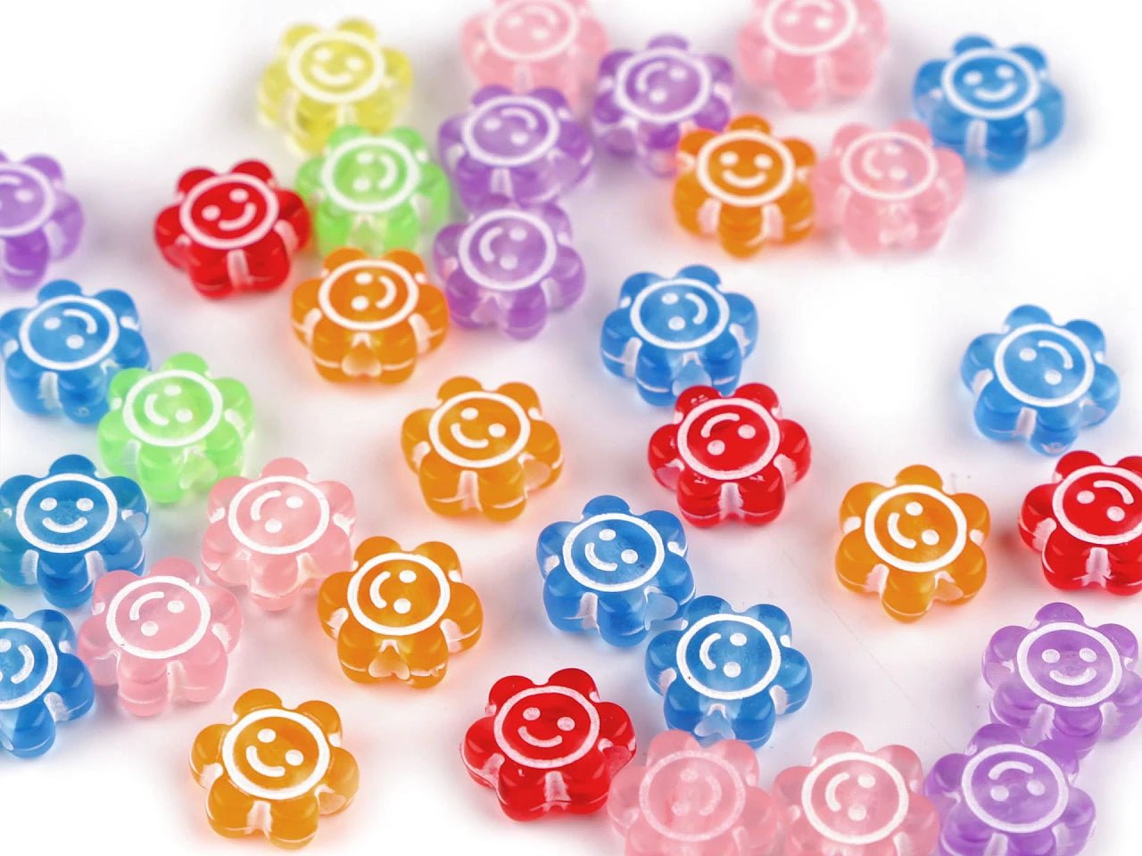 Image with plastic flower beads Ø11 mm 10 g | assorted shades – available at Charlotte’s Fabrics