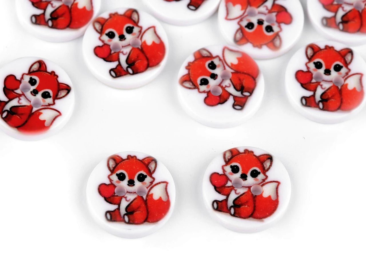 Image of patterned buttons Ø 15,5 mm – available at Charlotte's Fabrics