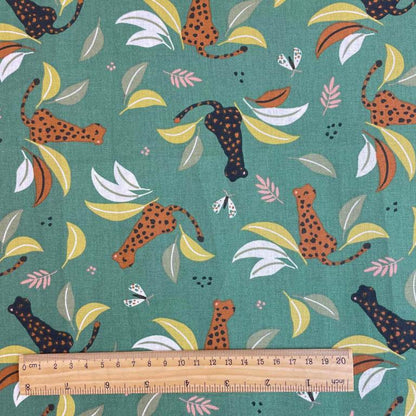 Tissu premium 100 % coton - Léopards tropicaux 115 g/m²