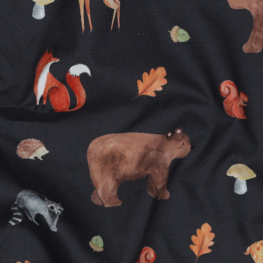 Image of premium 100% cotton fabric with an autumn motif on dark blue — available online at Charlotte Fabrics