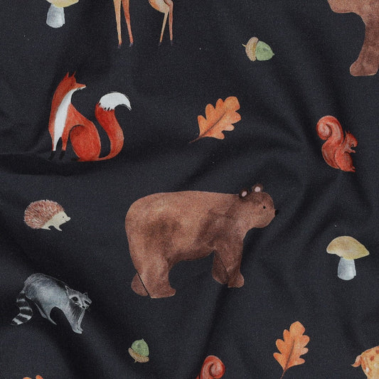 Image of premium 100% cotton fabric with an autumn motif on dark blue — available online at Charlotte Fabrics