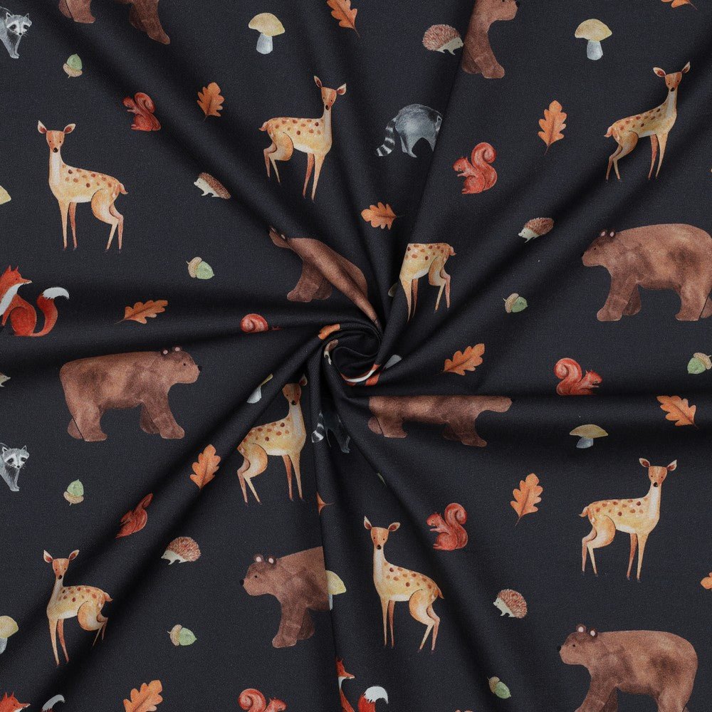 Image of premium 100% cotton fabric with an autumn motif on dark blue — available online at Charlotte Fabrics