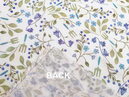 Image of premium lightweight 100% cotton fabric with blue flowers – available online at Charlotte Fabrics