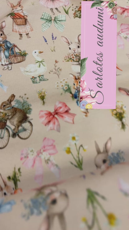 cotton loopback knit - bunnies on beige background 250 g/m²