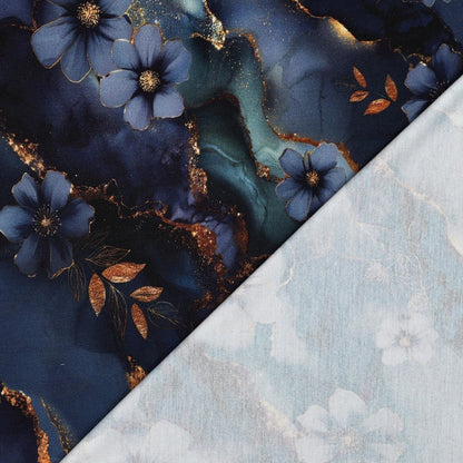 Image of Punto di Roma knit fabric with a blue and gold motif – available online at Charlotte's Fabrics