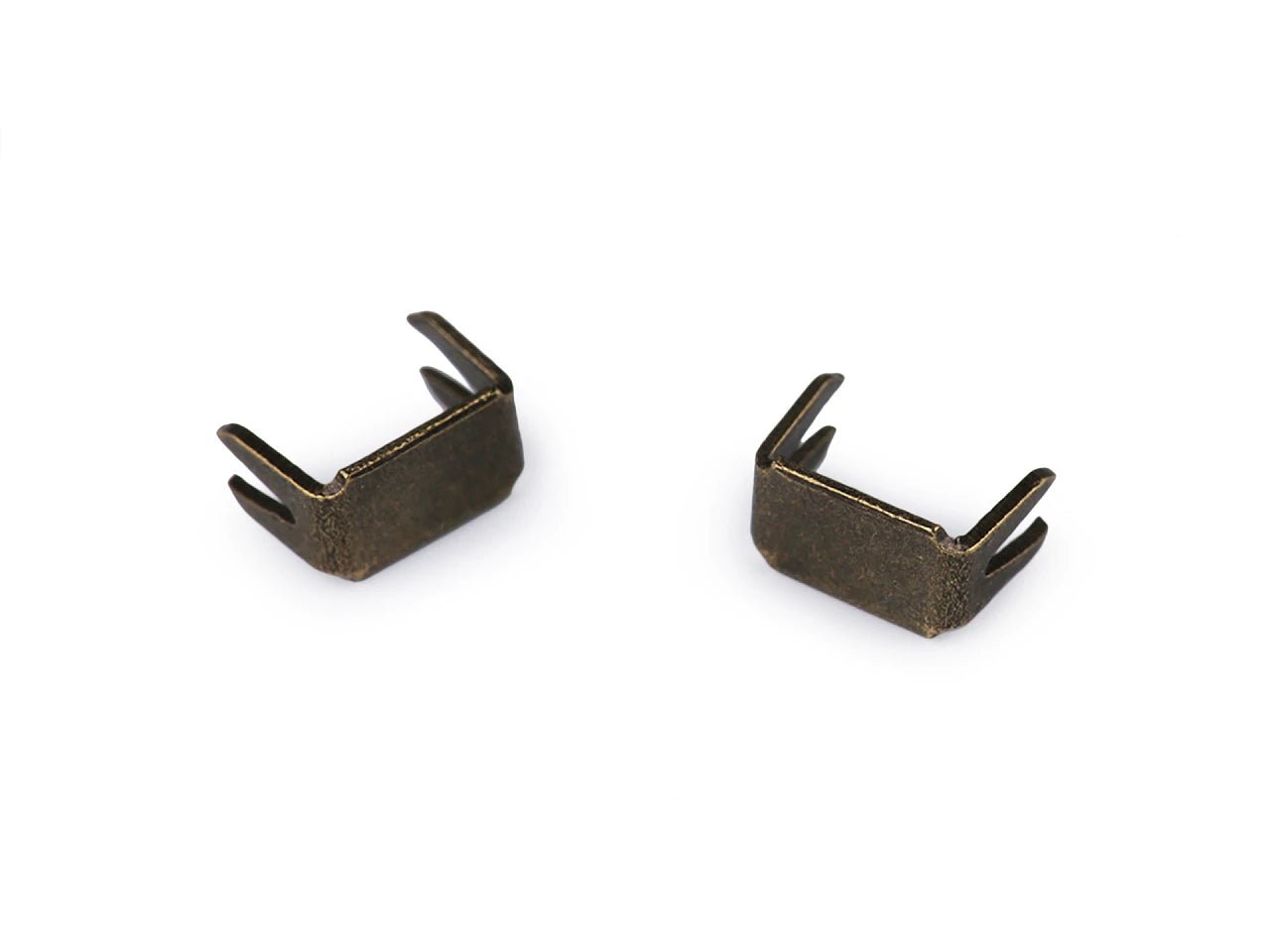 Image avec embout de fermeture éclair métallique n° 3 – 3 × 5 mm, couleur bronze antique – disponible en ligne chez Charlotte Fabrics