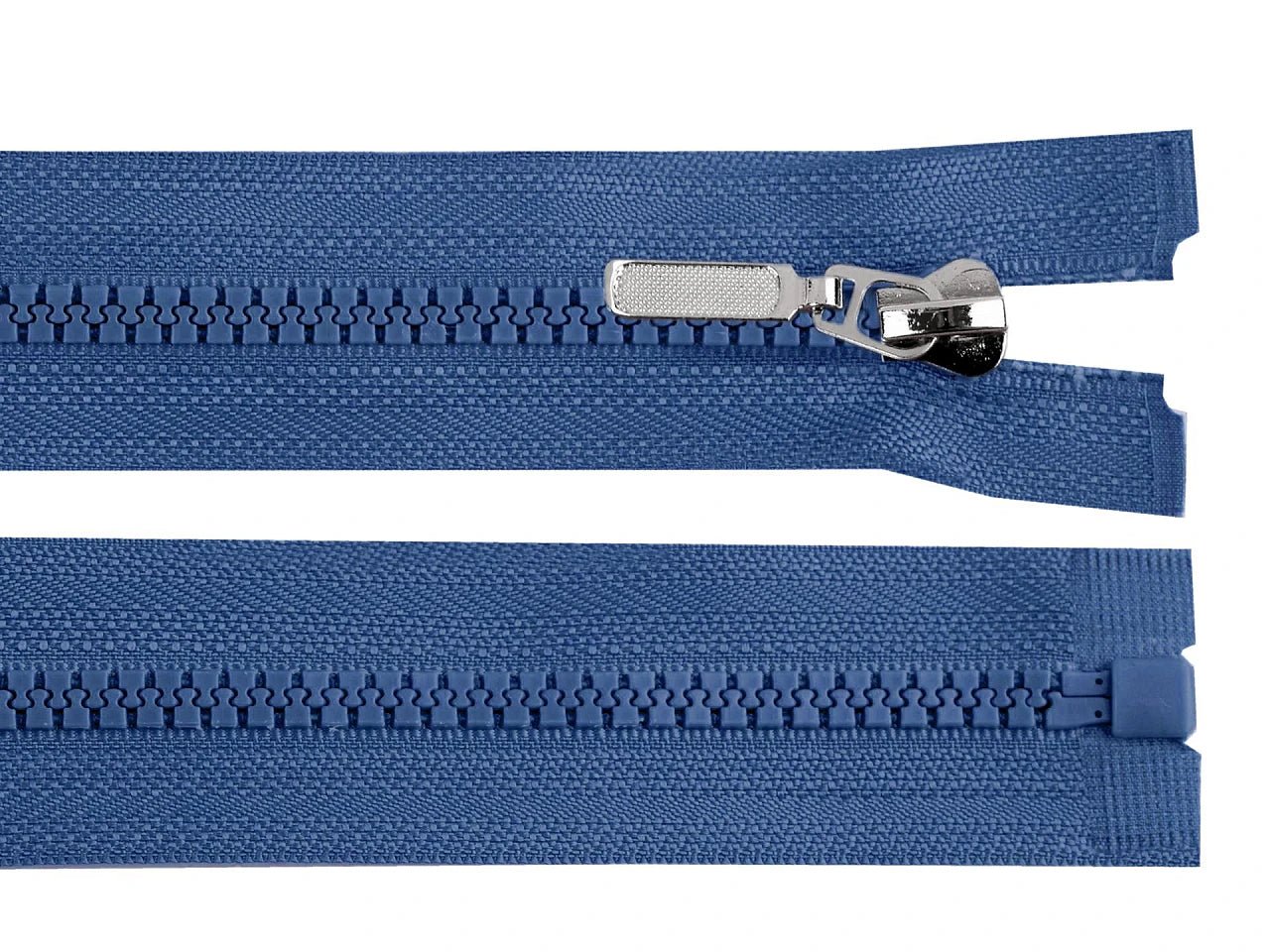 Image d’un tracteur à fermeture éclair, bleu jean, disponible chez Šarlotes audumi