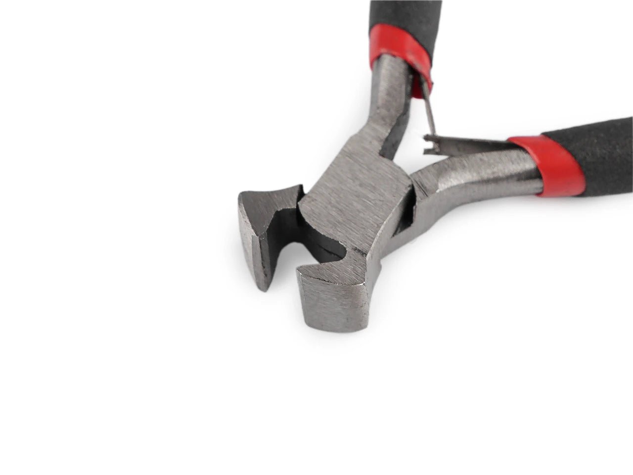 Image of zipper repair and top-stop pliers – available at Charlotte's Fabrics