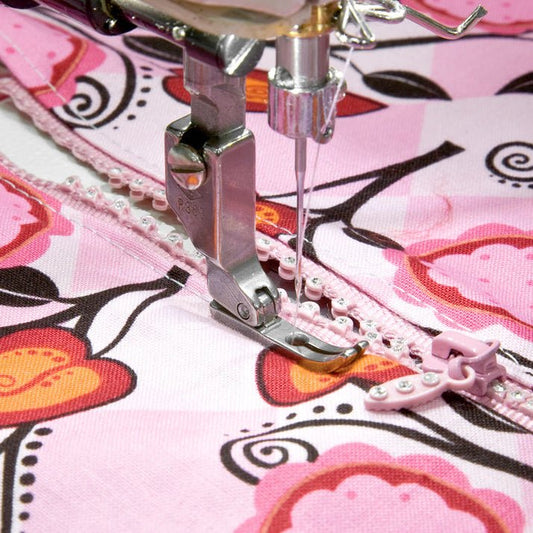 alt
Image of an industrial sewing machine zipper foot, double-sided, narrow – available at Charlotte's Fabrics